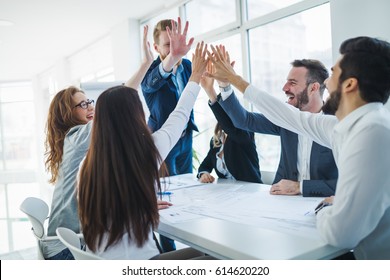 Happy business colleagues celebrating successful business year - Powered by Shutterstock