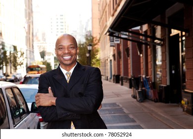 A Happy Business Man On A Street In A City