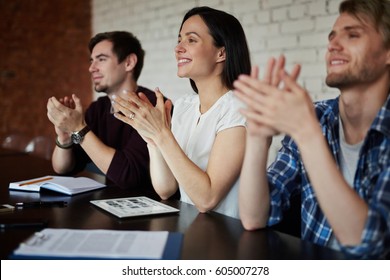 Happy Business People Applauding To Speaker At Conference