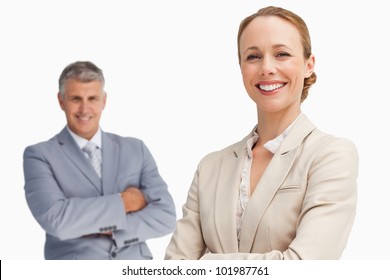 Happy Business People With Folded Arms Against White Background