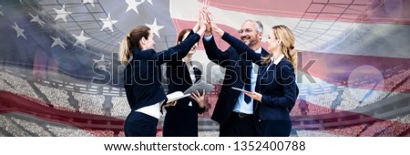 Happy business people giving high five against white background against close-up of an american flag