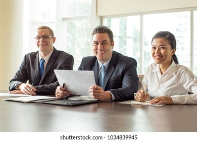 Happy Business People Meeting at Conference Hall - Shutterstock ID 1034839945