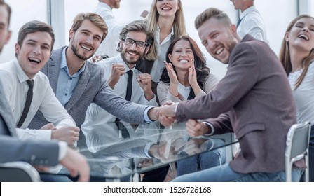 happy business people shaking hands in the conference room - Shutterstock ID 1526726168