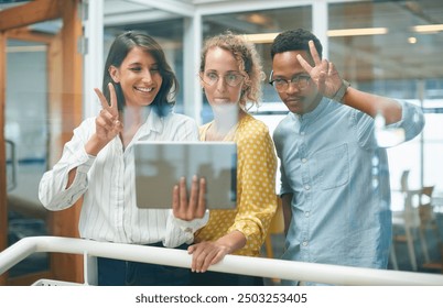 Happy business people, tablet and funny selfie with team for memory, photography or moment together at office. Group of employees with peace sign and silly face on technology for picture at workplace - Powered by Shutterstock