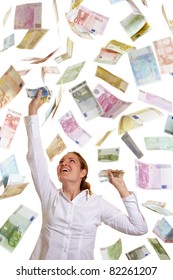 Happy Business Woman Catching Falling Euro Money