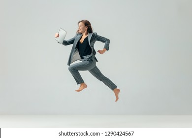 Happy Business Woman Dancing And Smiling In Motion Isolated Over White Studio Background. Human Emotions Concept.  The Businesswoman, Office, Success, Elegance, Grace, Performer, Flexible Concepts