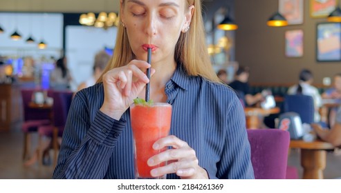 Happy Business Woman Drinking Healthy Strawberry Banana Smoothie From Straw