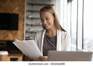 Happy Business Woman, Office Employee, Assistant Reviewing Papers, Reading Documents, Receiving Letter With Good News, Contract Project, Approved Loan Bank Notice, Agreement. Paperwork Concept