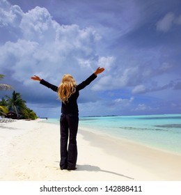 Happy  Business Woman On The Desolate Ocean Coast