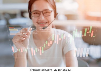 Happy business woman smiling using modern technology holo graphics overlay trade stock chart order. - Powered by Shutterstock