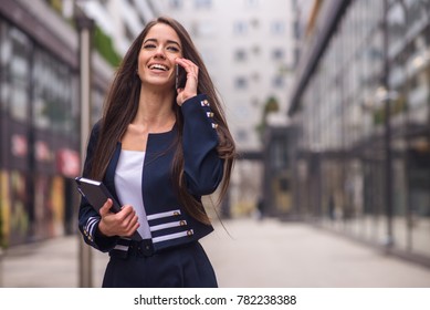 Happy Business Woman Talking On Phone