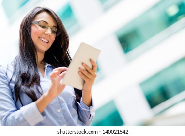 Happy Business Woman Using A Tablet Computer