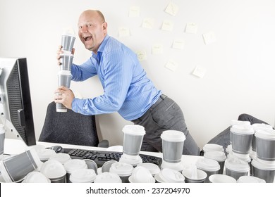 Happy Businessman Drinks Too Much Coffee
