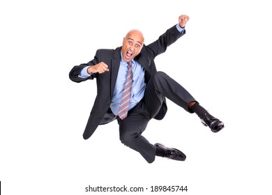 Happy businessman jumping high isolated in white
