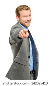 Happy businessman pointing on white background