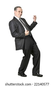 Happy Businessman In A Suit Playing An Air Guitar Isolated On White Background