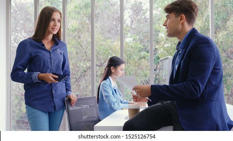 Happy businesswoman and businessman having conversation in modern office. Business corporate and community concept. - Shutterstock ID 1525126754
