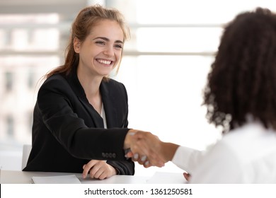 Happy Businesswoman Hr Manager Handshake Hire Candidate Selling Insurance Services Making Good First Impression, Diverse Broker And Client Customer Shake Hand At Business Office Meeting Job Interview