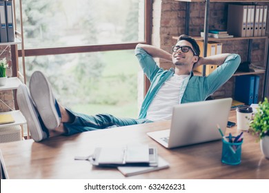 Happy Calm Smiling Man Having A Rest After Solving All The Tasks At Work