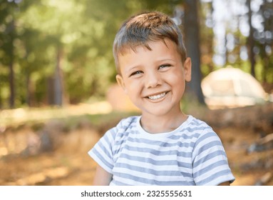 Happy, camping and portrait of child in park smile for playing, adventure and freedom in nature. Childhood, happiness and face of little boy in woods or forest for hiking, traveling and trekking - Powered by Shutterstock
