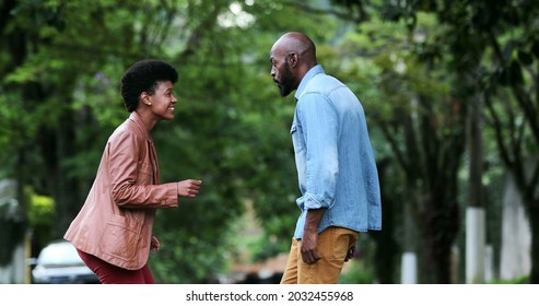 Happy Carefree Black Couple Dancing Together Outside In Street