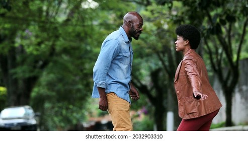 Happy Carefree Black Couple Dancing Together Outside In Street