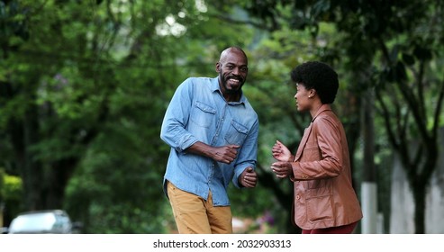 Happy Carefree Black Couple Dancing Together Outside In Street