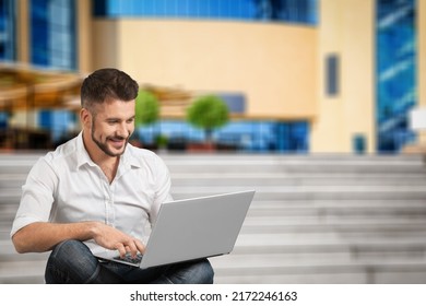 Happy Carefree Male Student Prepare Project Working Laptop Outside The University