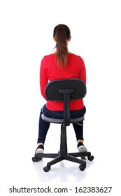 Happy Casual Woman Sitting On A Chair. Back View. Isolated On White. 