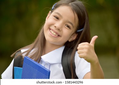 Happy Catholic Minority Girl Student With Books