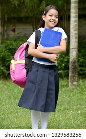 Happy Catholic Student Child Wearing School Uniform With Books