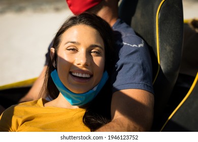 Happy caucasian couple wearing face masks sitting in beach buggy smiling. beach stop off on summer holiday road trip during coronavirus covid 19 pandemic. - Powered by Shutterstock