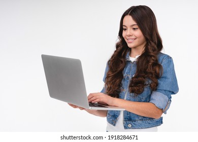 Happy Caucasian Girl Using Laptop In Casual Attire Isolated In White Background