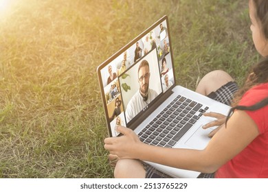 happy caucasian kid has online lesson on laptop during coronavirus covid-19 pandemic and lockdown. - Powered by Shutterstock