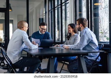 Happy Caucasian Man, Informing His Staff About The Company Progress.