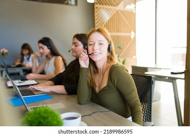 Happy Caucasian Woman And Sales Representative Agent Smiling While Using headset And Talking With A Customer