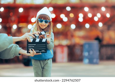 
Happy Charismatic Child Actor Performing in a Kids Movie. Adorable fashion model for kids clothing commercial 
 - Powered by Shutterstock