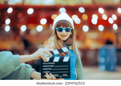 
Happy Charismatic Child Actor Performing in a Kids Movie. Adorable fashion model for kids clothing commercial 
 - Powered by Shutterstock