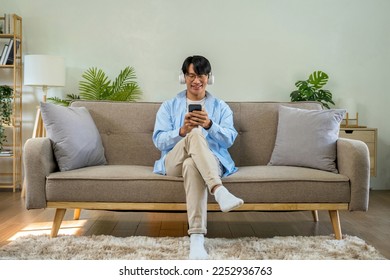 Happy cheerful businessman in home office. - Shutterstock ID 2252936763