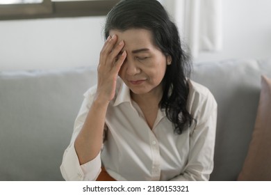 Happy And Cheerful Older Lady Mature Asian Woman Had Headache  Pain Or Sick Health Care Concept.