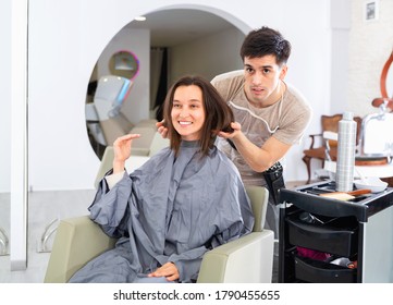 Happy Cheerful Positive Smiling  Young Woman And Hairdresser After Haircut In Hairdressing Salon