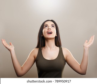 Happy Cheerful Young Woman With Arms Up 