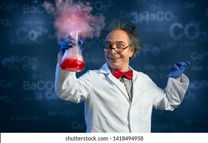 
Happy Chemist Holding Test Tube With His Successful Experiment