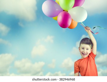 Happy Child With Balloons.