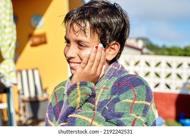 Happy Child In Bathrobe With Painted Nails