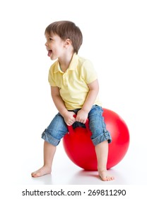 Happy Child Boy Jumping On Bouncing Ball. Isolated On White.