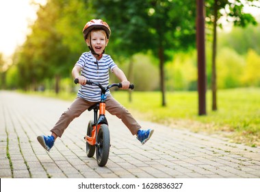 happy child boy rides a racetrack in Park in the summer
 - Powered by Shutterstock