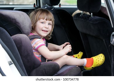 Happy Child In Carseat