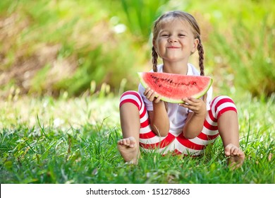 Happy Child Eating Watermelon