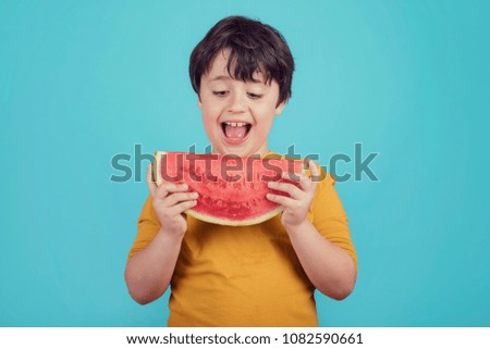 Similar – Glückliches Kind isst Wassermelone